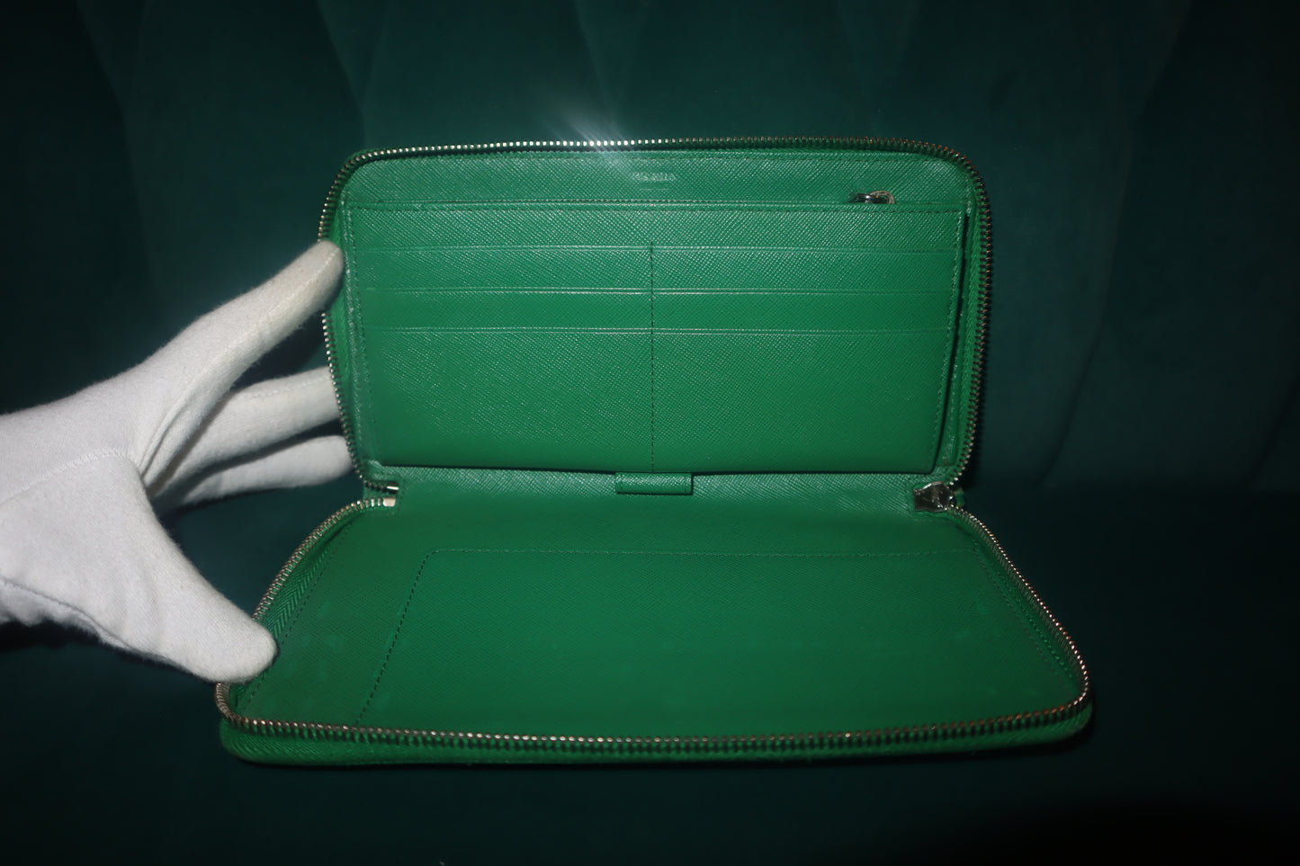 Preowned Prada leather zippy, green wallet